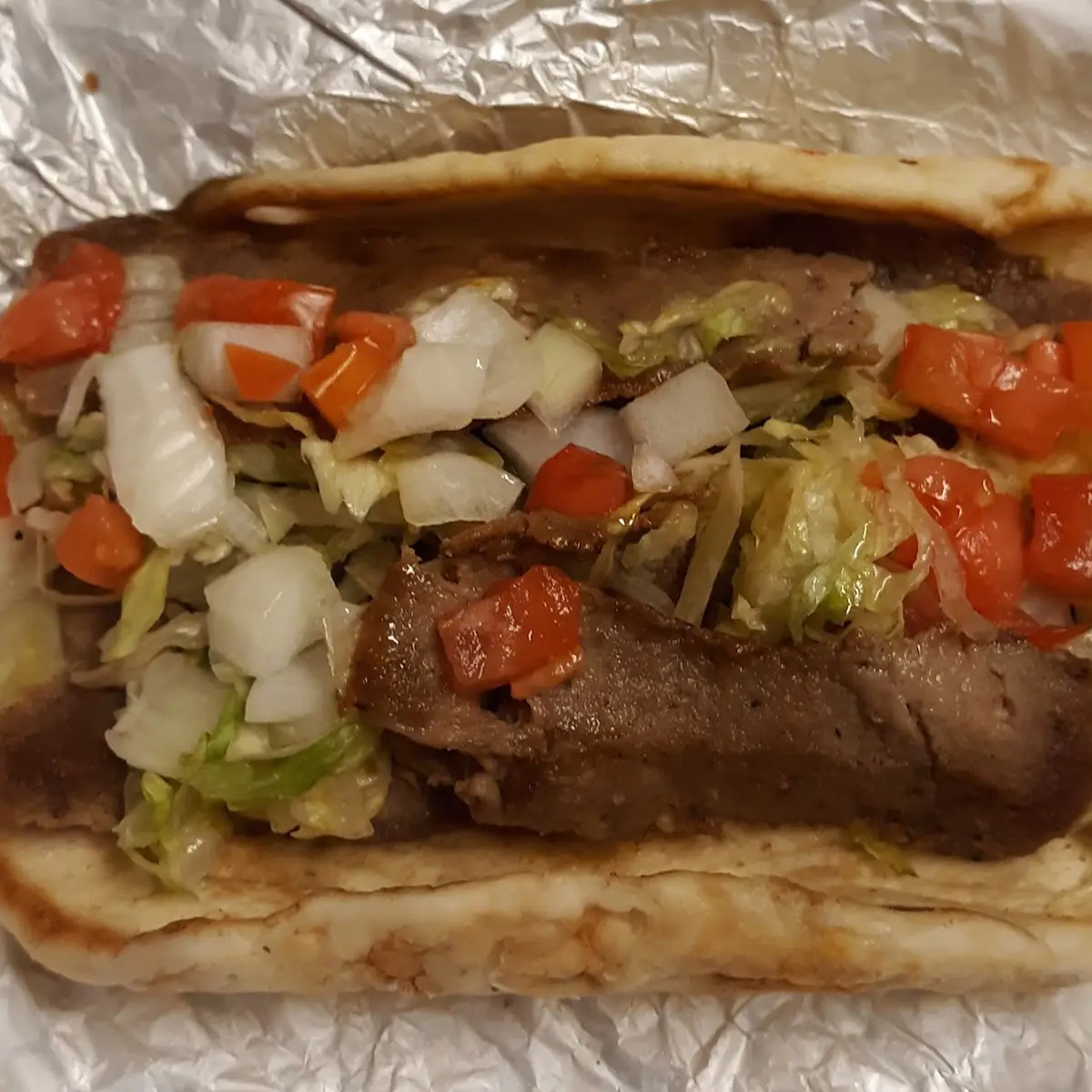 Lightly Toasted Pita Filled with Tender Gyro