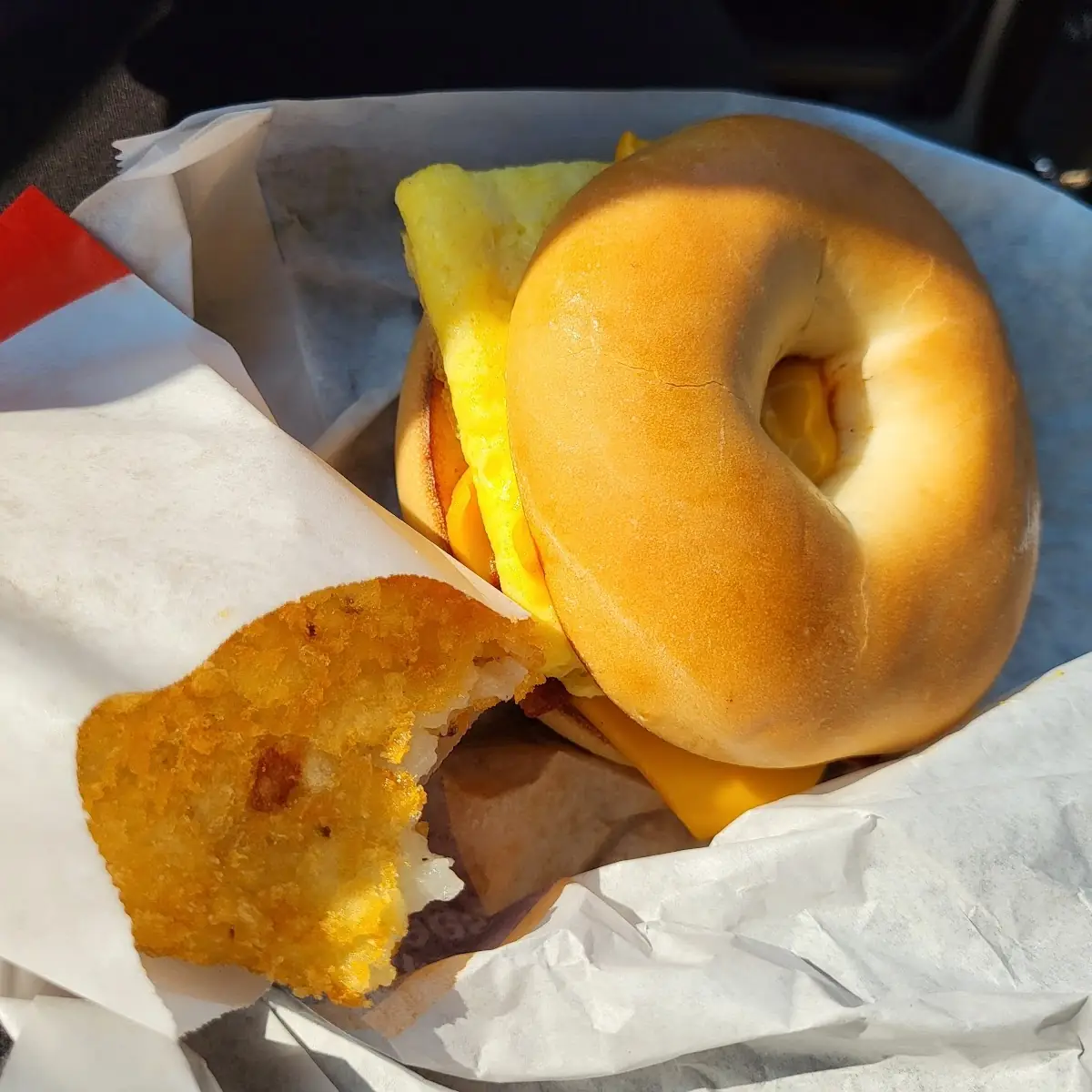Bacon Egg and Cheese Bagel with Hash Browns