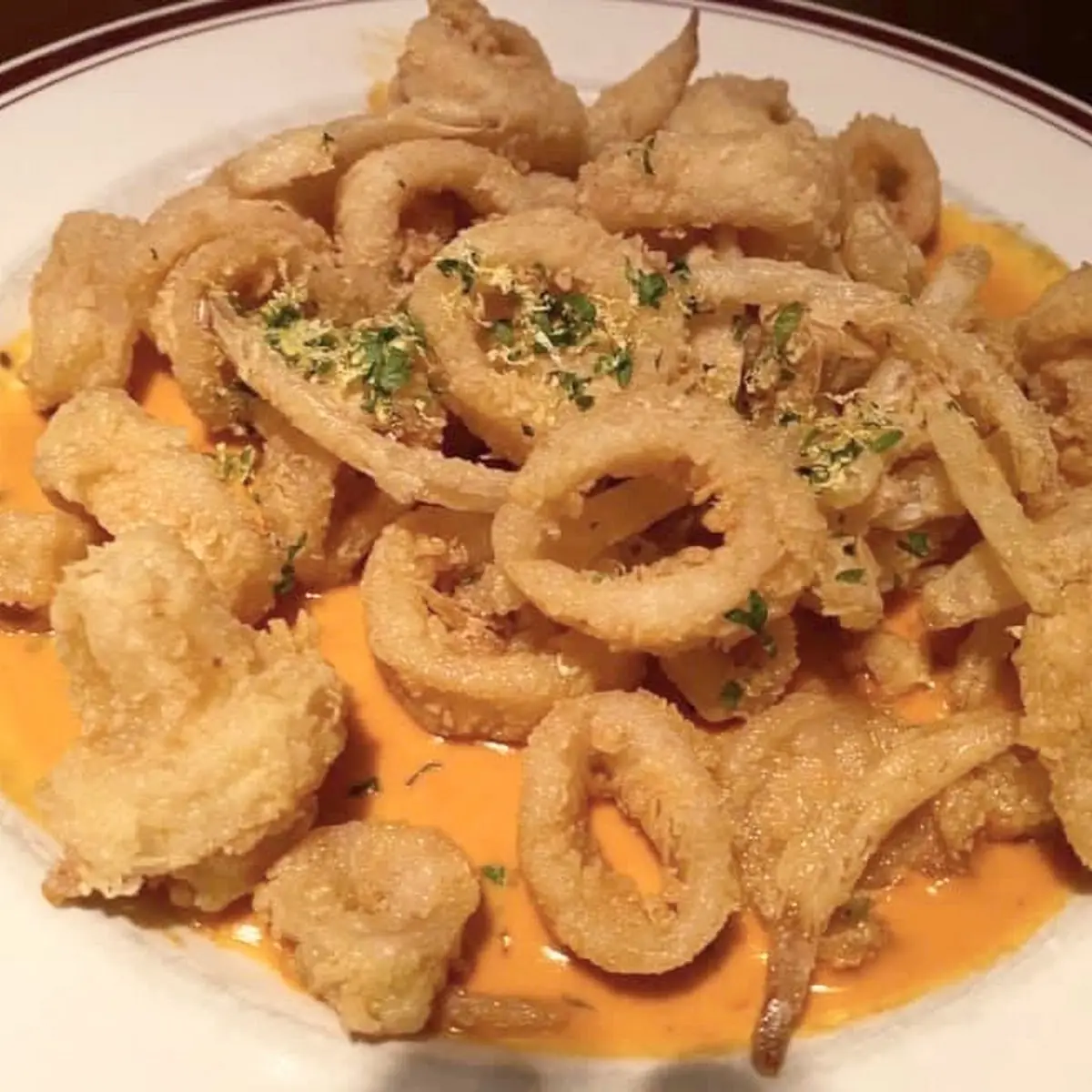 Crispy Fried Point Judith Calamari with Onion Straws & Lobster Ginger Sauce