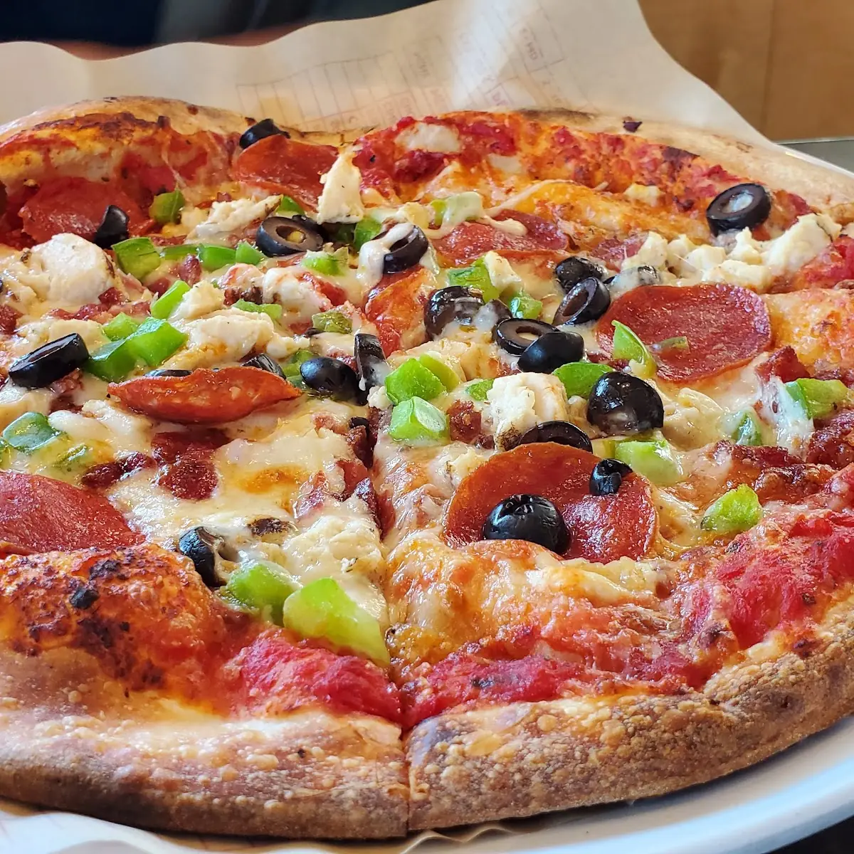 Personalized Pizza with Pepperoni Chicken Black Olives and Bell Peppers