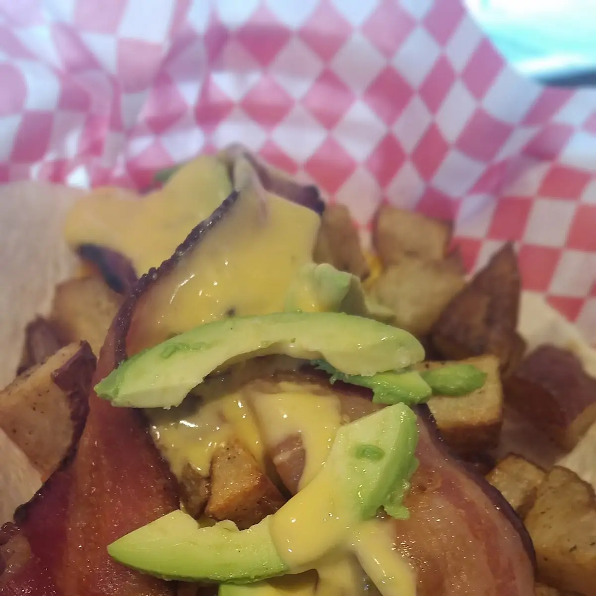 Breakfast Taco with Jalapèno Cheese Sauce and Avocado Slices