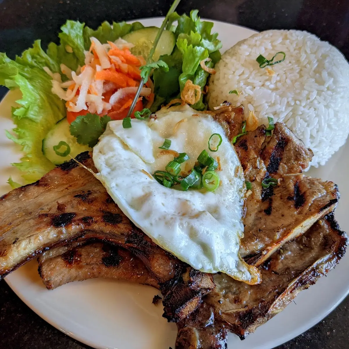 Grilled Pork Chop with an Egg