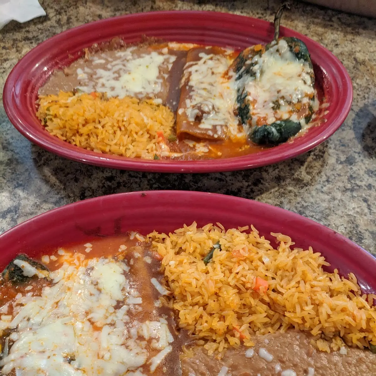 One Chile Relleno and One Cheese Enchilada Served with Rice and Beans