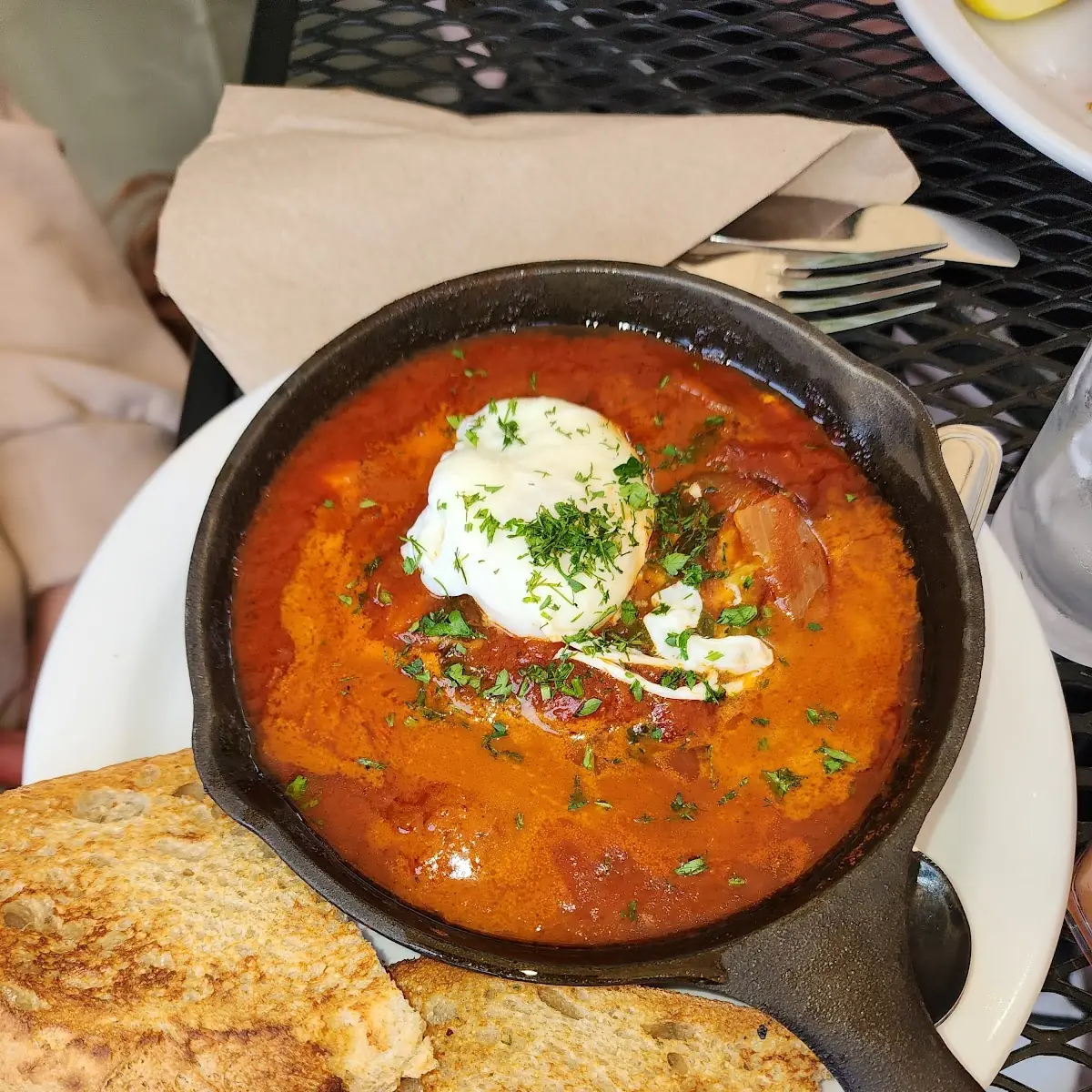 Shakshuka with Poached Egg and Bread