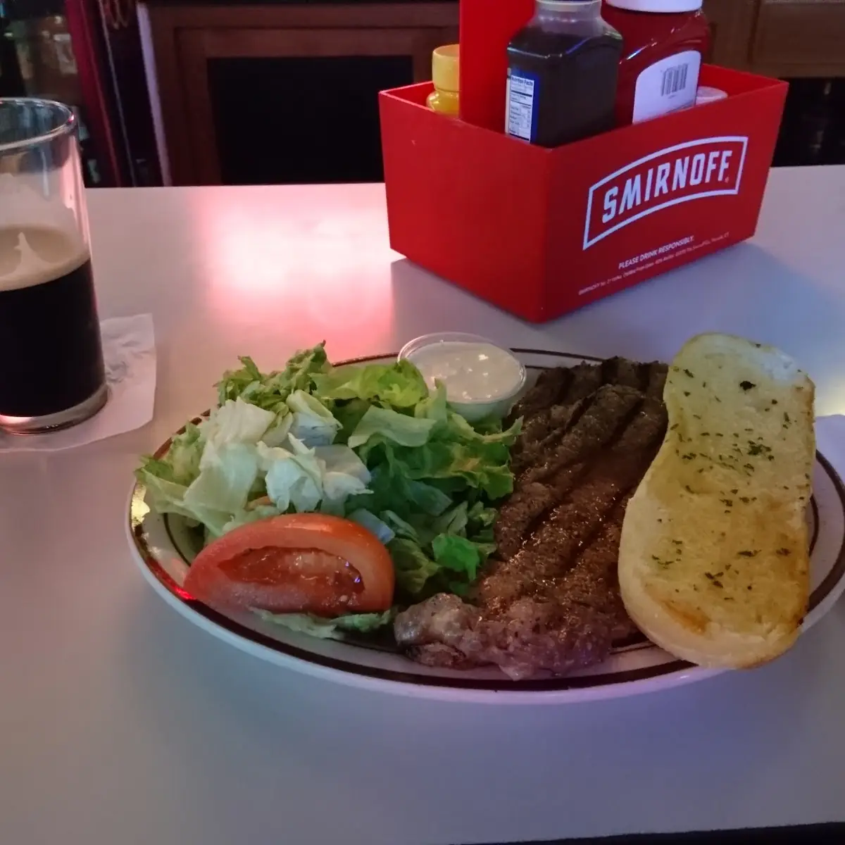 Rib Eye Steak with Salad and Garlic Bread