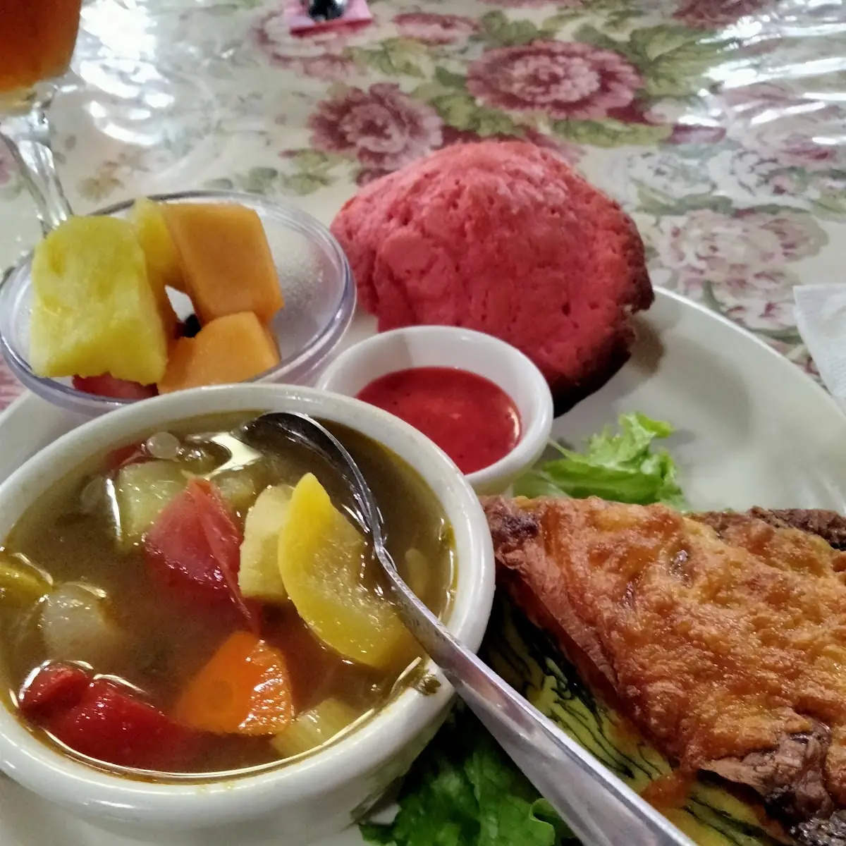 Quiche with Mushrooms Vegetable Soup Fruit Bowl with Muffin