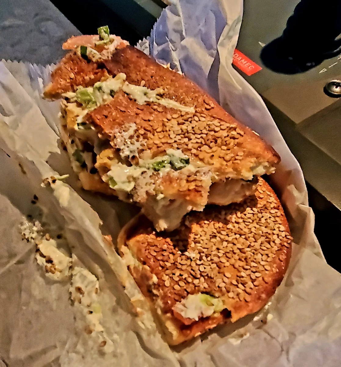 Sesame Bagel with Scallion Cream Cheese and Tomato