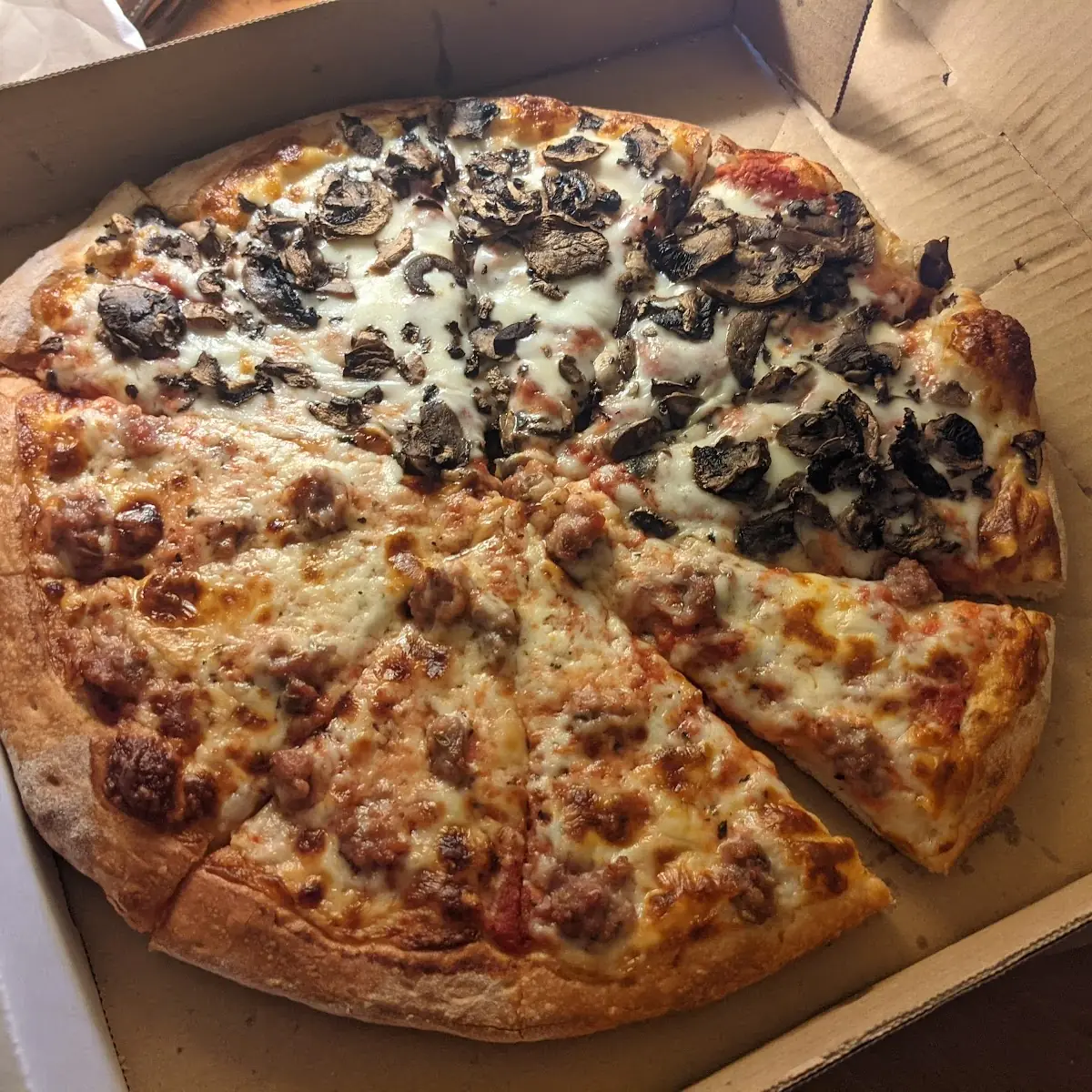 Half Mushroom Half Sausage Pizza