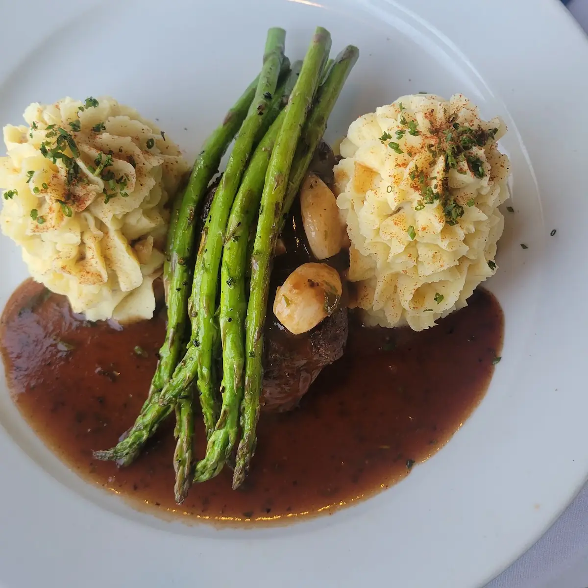 Plated Steak Mashed Potatoes and Asparagus