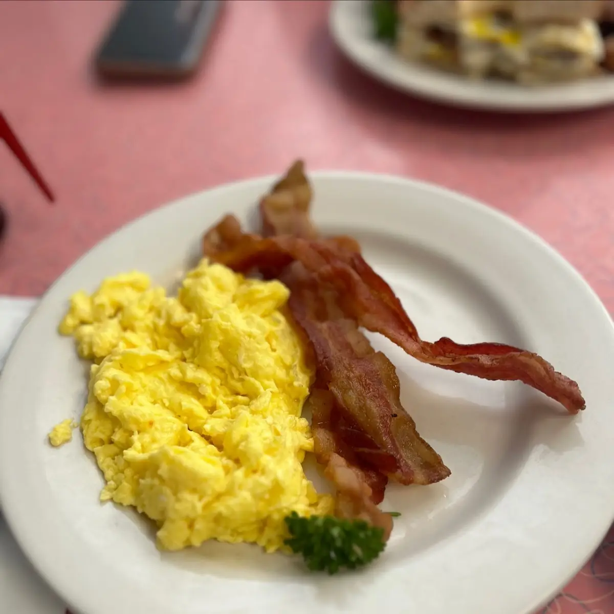 Two Scrambled Eggs and Bacon