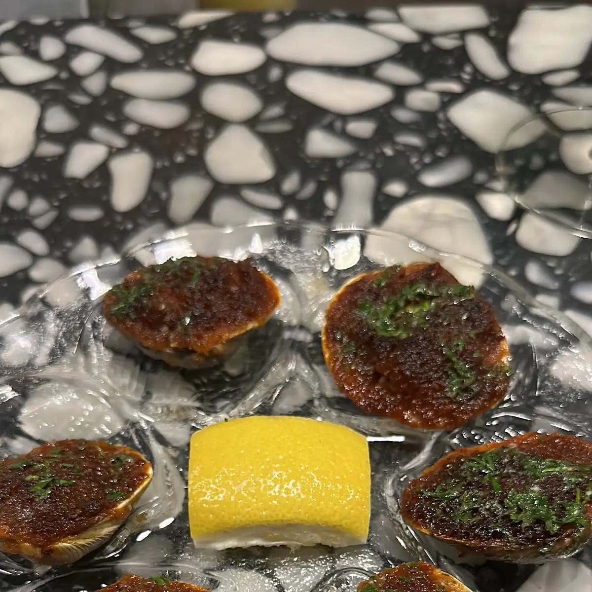 Baked Clams with Lemon Wedge