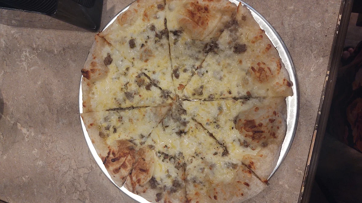 Breakfast Pizza with Sausage Egg and Cheese