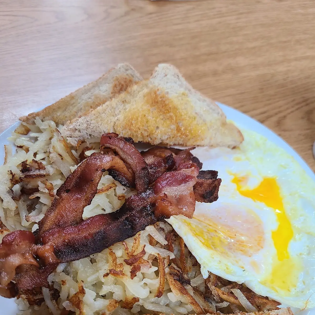 Bacon Eggs Hash Browns and Toast