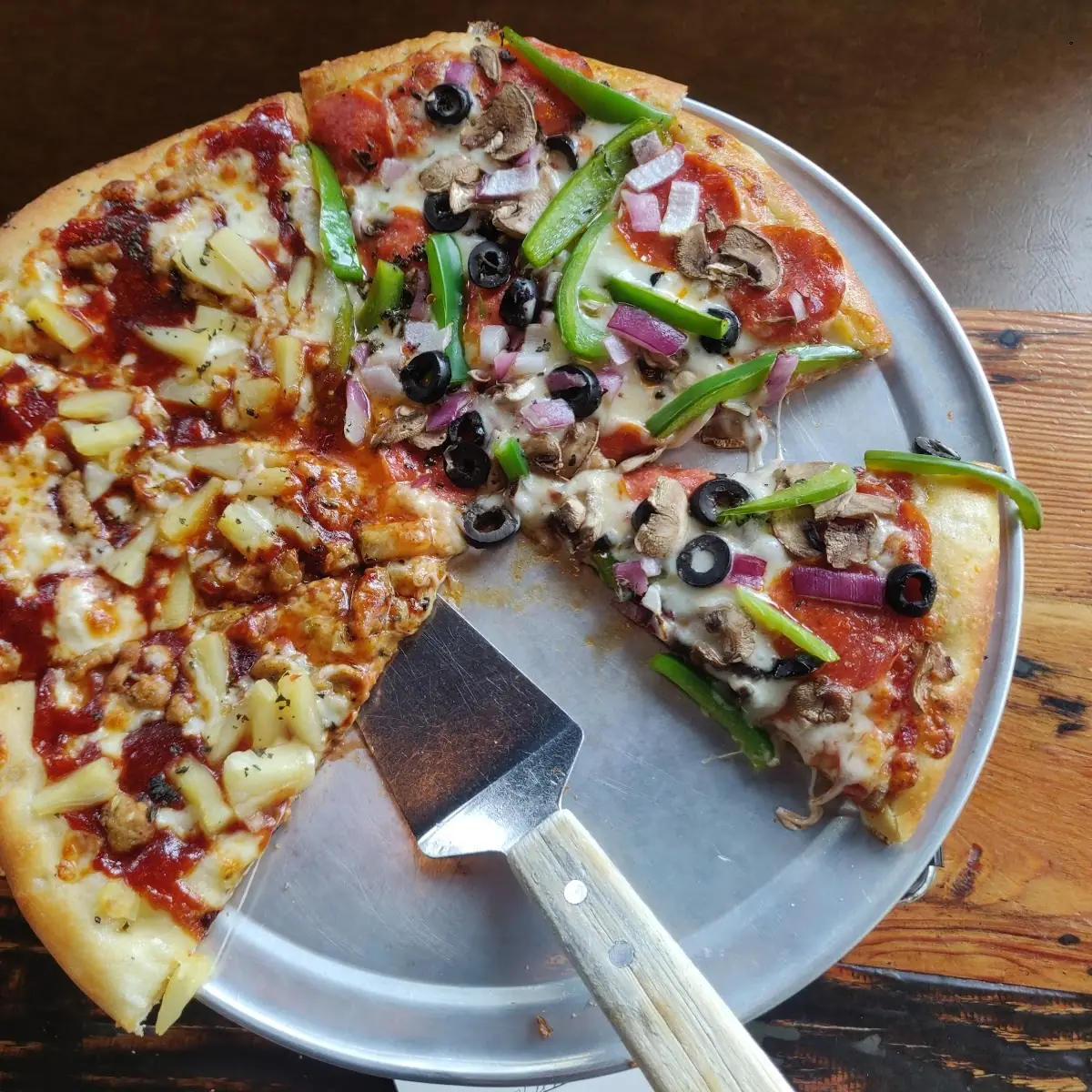 Half BBQ Chicken Half Supreme Pizza