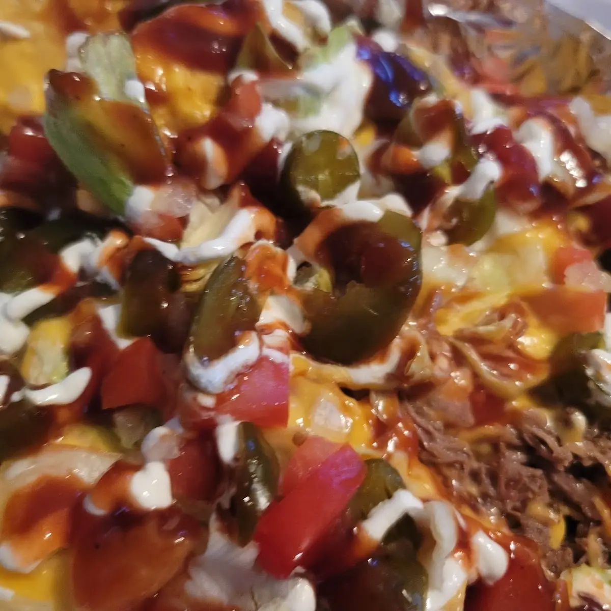 Brisket Nachos with BBQ Sauce And
