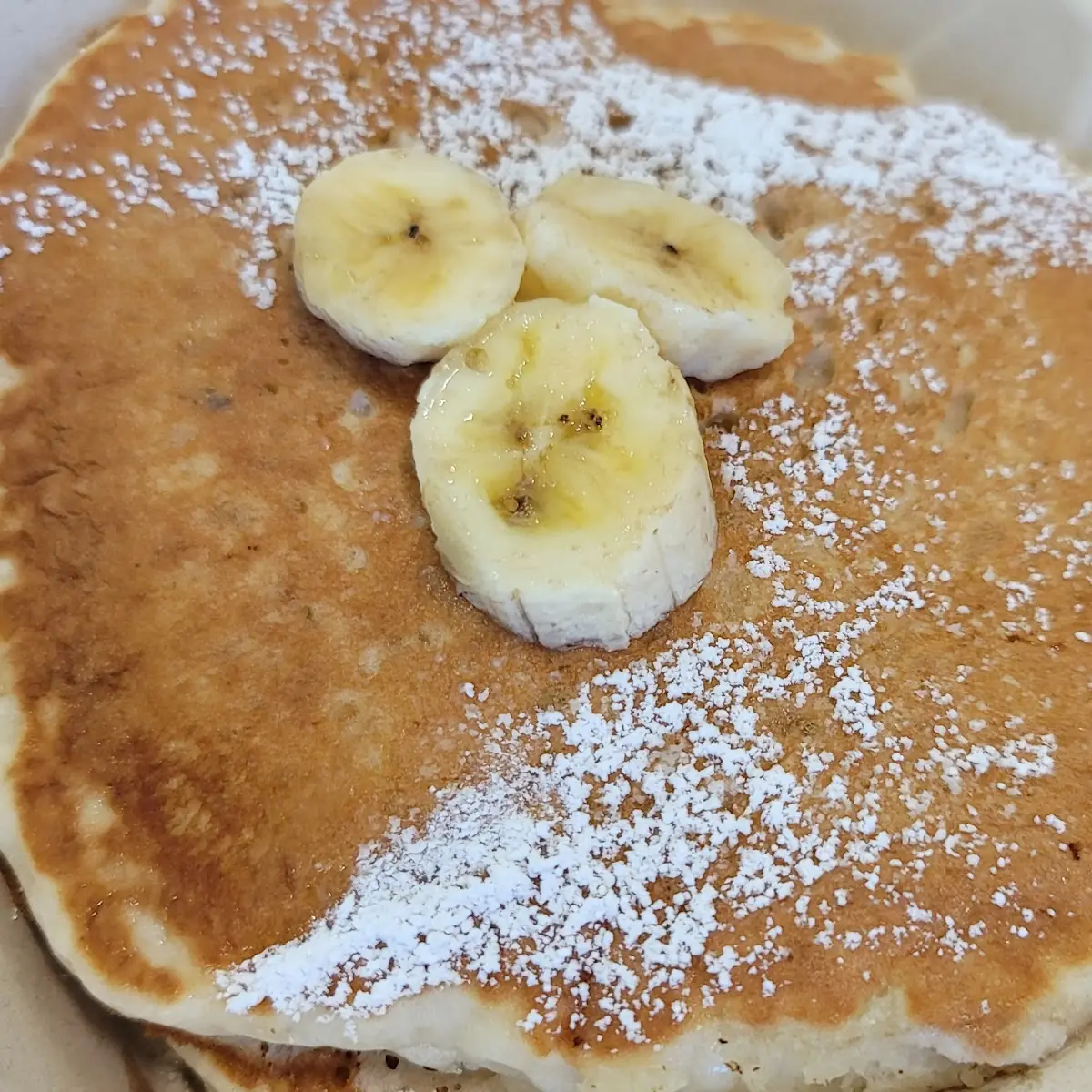 Banana Pancakes with Powdered Sugar