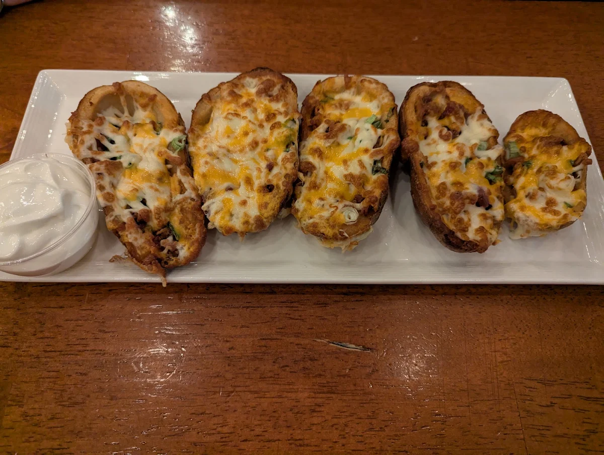 Potato Skins with Bacon Cheddar & Green Onions Served with Sour Cream, The Hideout