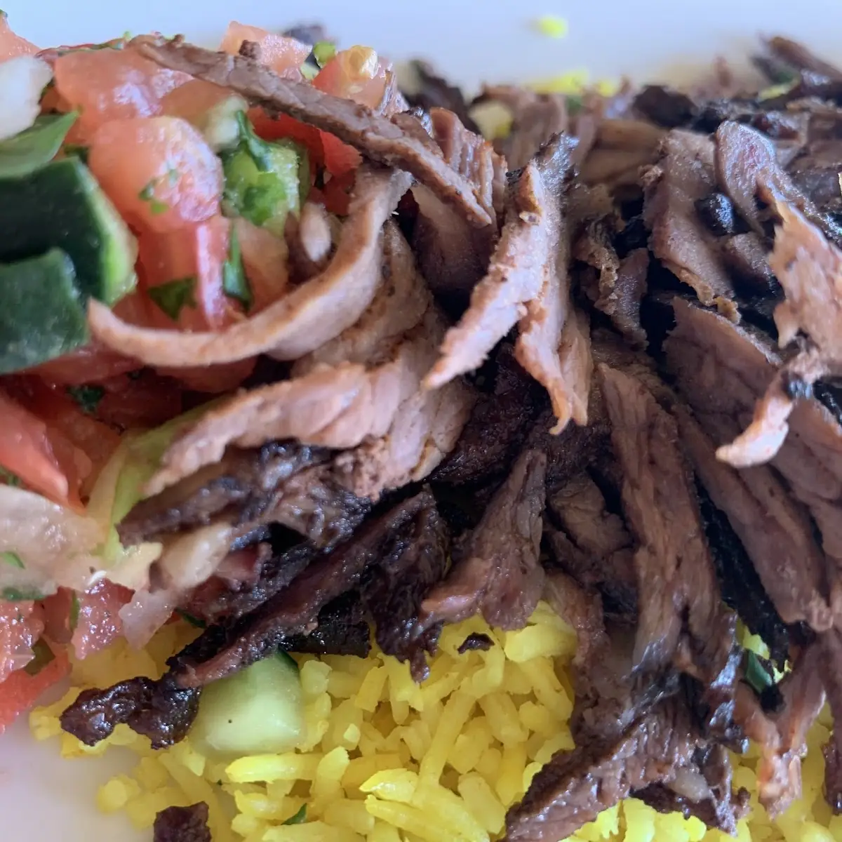 Beef and Lamb Shawarma Sandwich on Pita Bread