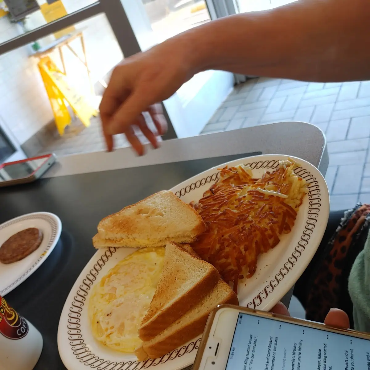 Eggs over Easy with Toast and Hash Browns