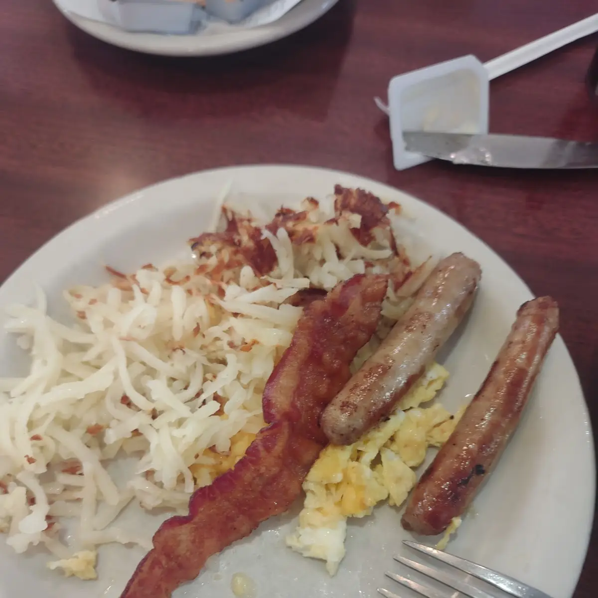 Eggs Hash Browns Bacon and Sausage Link