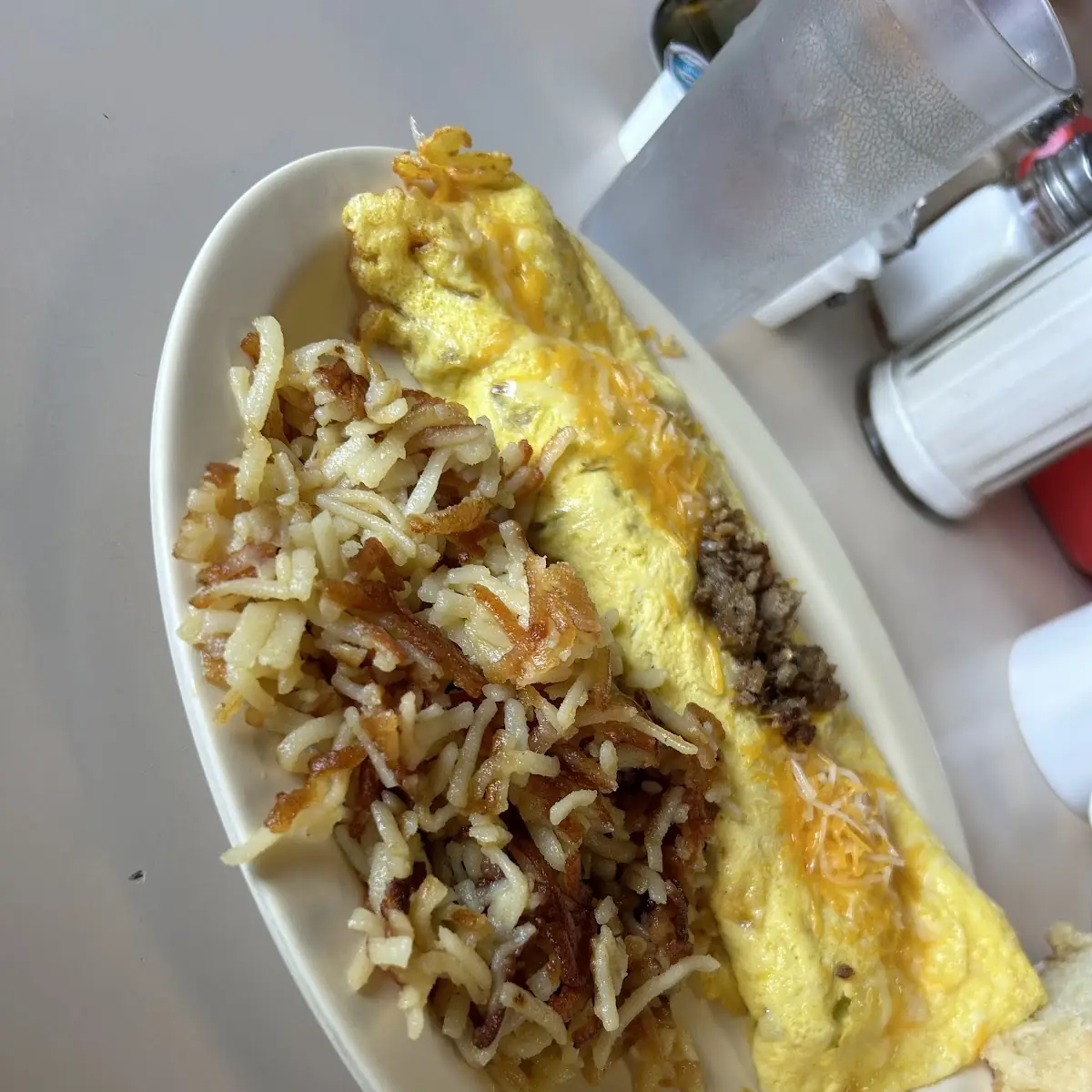Bacon and Cheese Omlet with Hash Browns