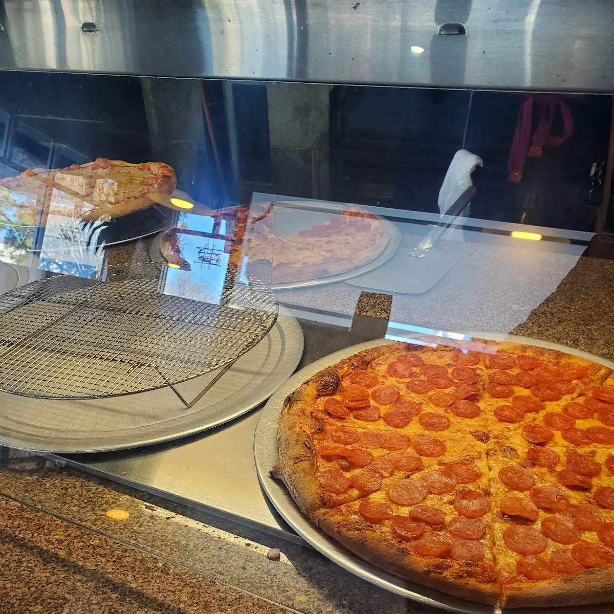 Pizza by the Slice Pepperoni Pizza