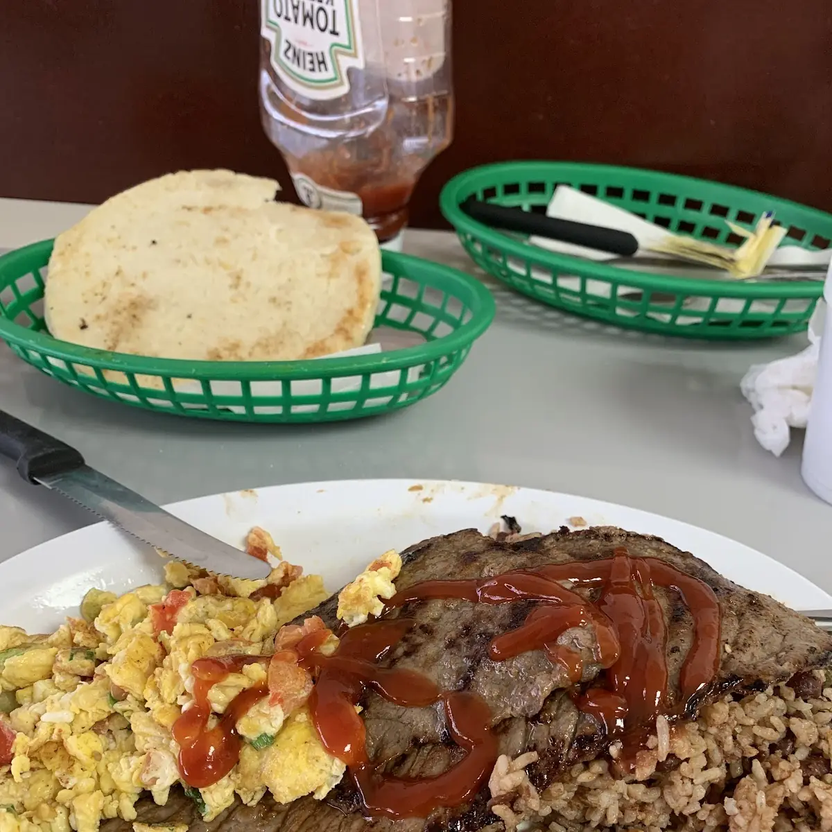 Refried Beans & Rice Steak Two Fried Eggs & Corn Meal