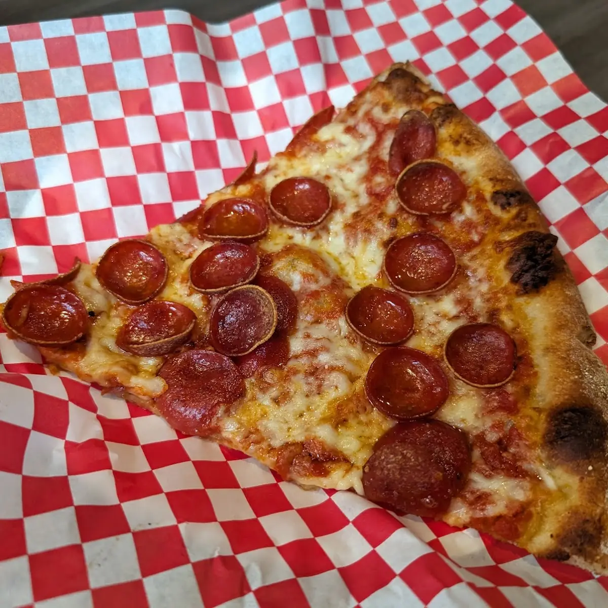 Pepperoni and Vegetable Pizza Slice
