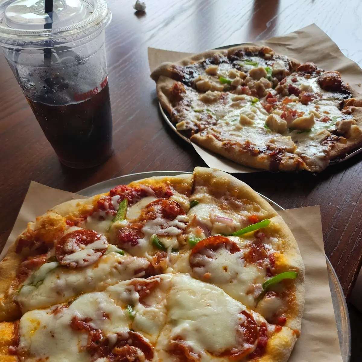 Personal and Sausage Pizza in Front