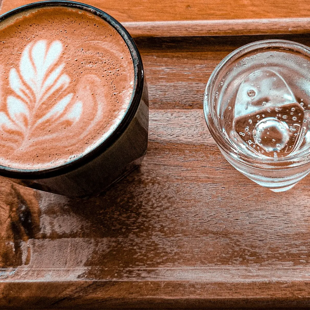 Cappuccino with a Sparkling Water