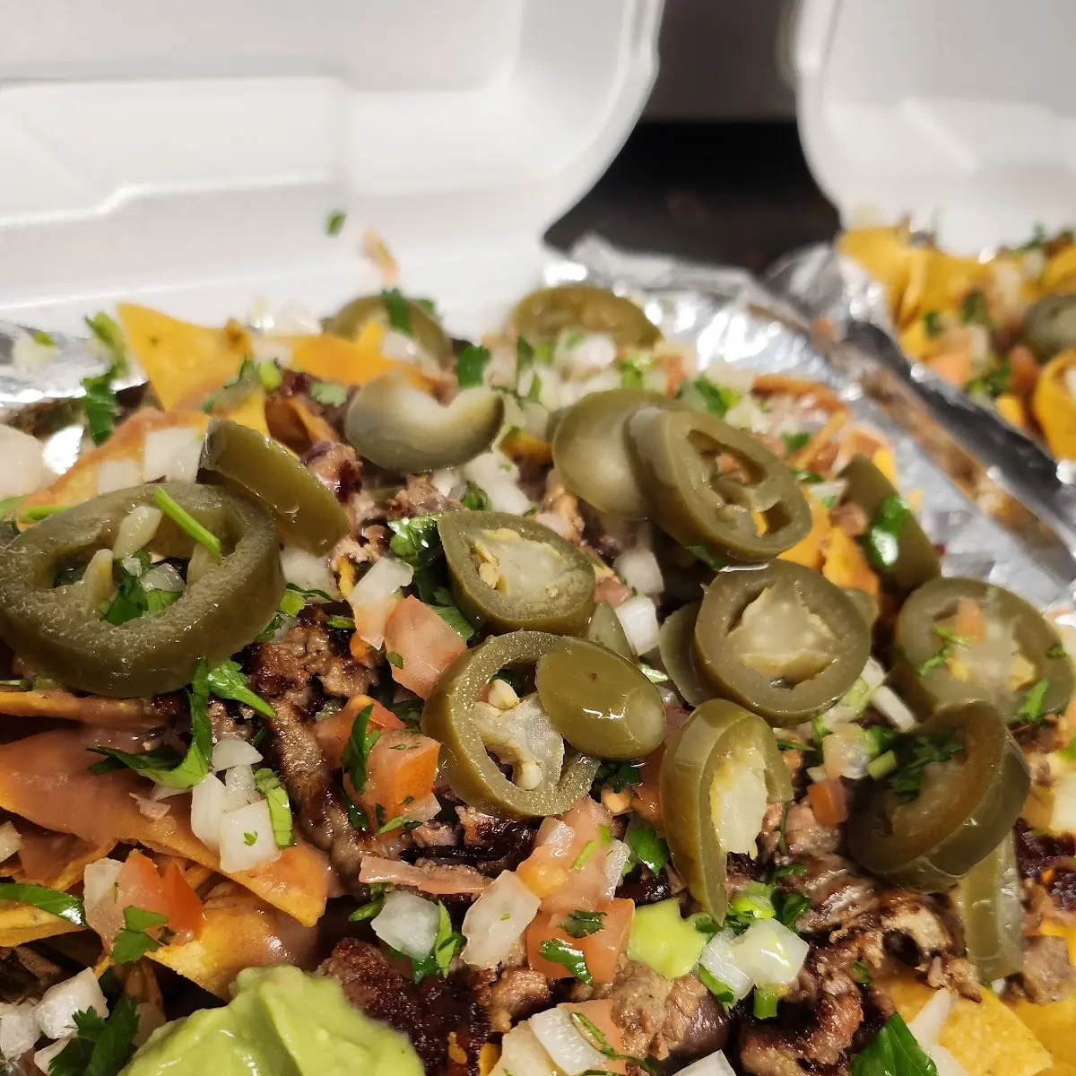Frida Nachos with Carne Asada