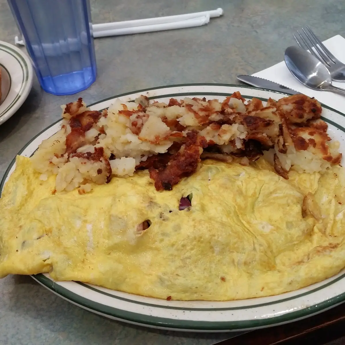 Ground Beef Patty Eggs Hash Browns and Bread