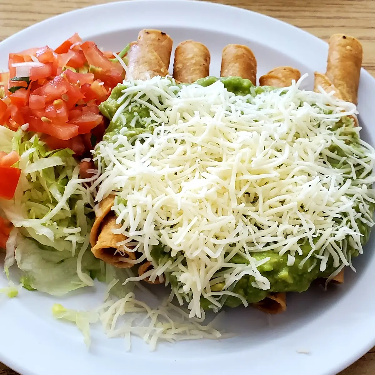Five Rolled Beef Tacos with Guacamole
