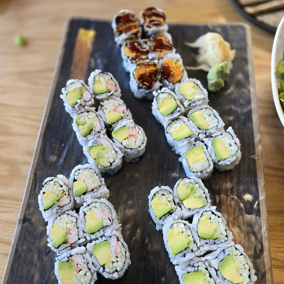 Mango Shrimp Roll Spicy Crunch Roll Eel Avocado Maryland Roll and Salmon Tempura Roll