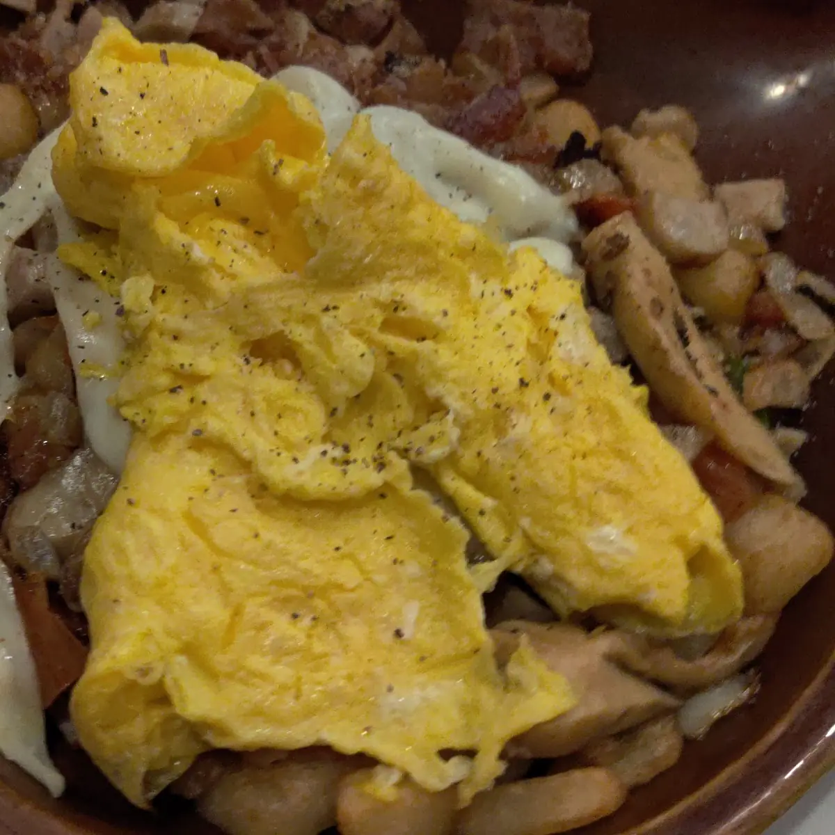 Works Skillet with Scrambled Eggs on Top