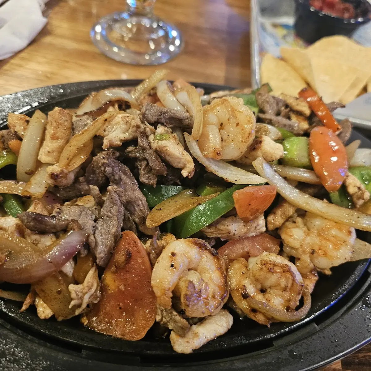 Steak Chicken and Shrimp Fajitas
