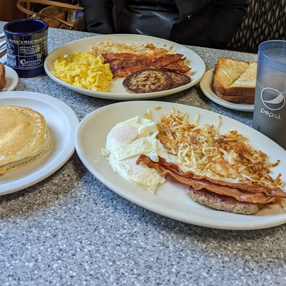 Two Eggs over Easy Hash Browns with Bacon and Cinnamon Bread