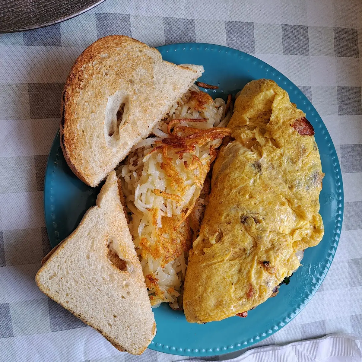 Omelette Hash Browns Bacon and Toast