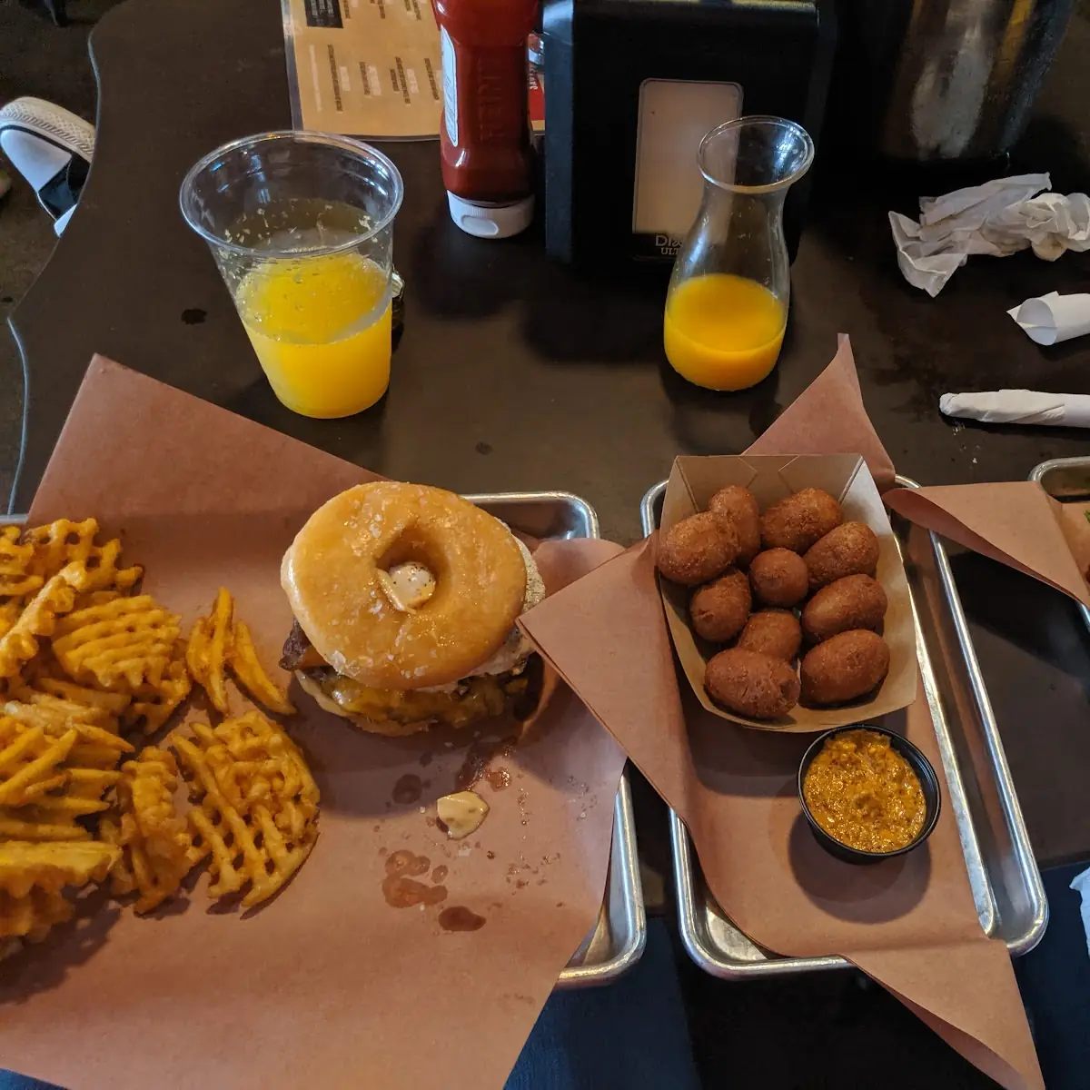 Voodoo Burger Mini Corn Dogs Chipotle Bacon Cheeseburger with Mimosa Bucket