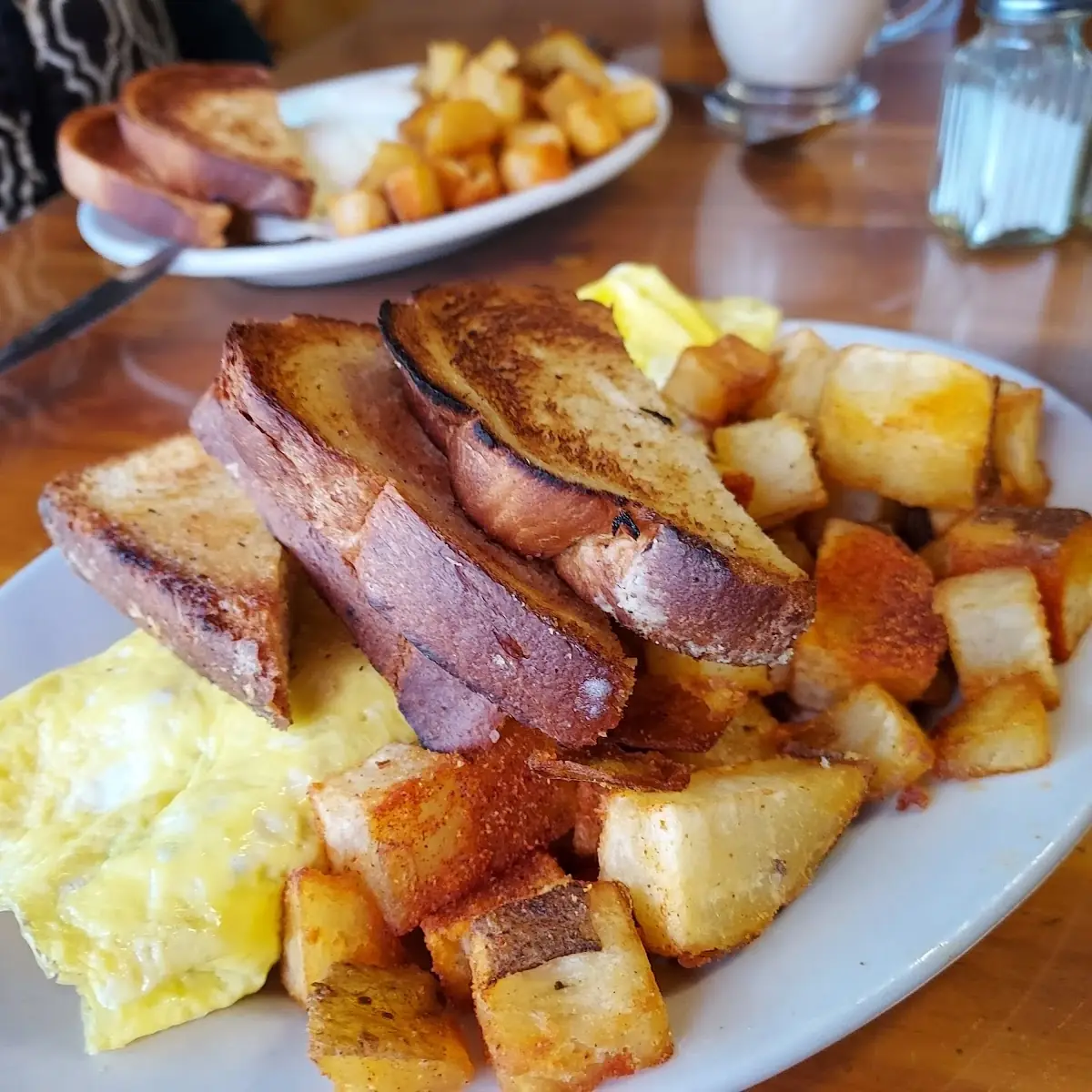 Two Eggs with Meat Toast and Homefries