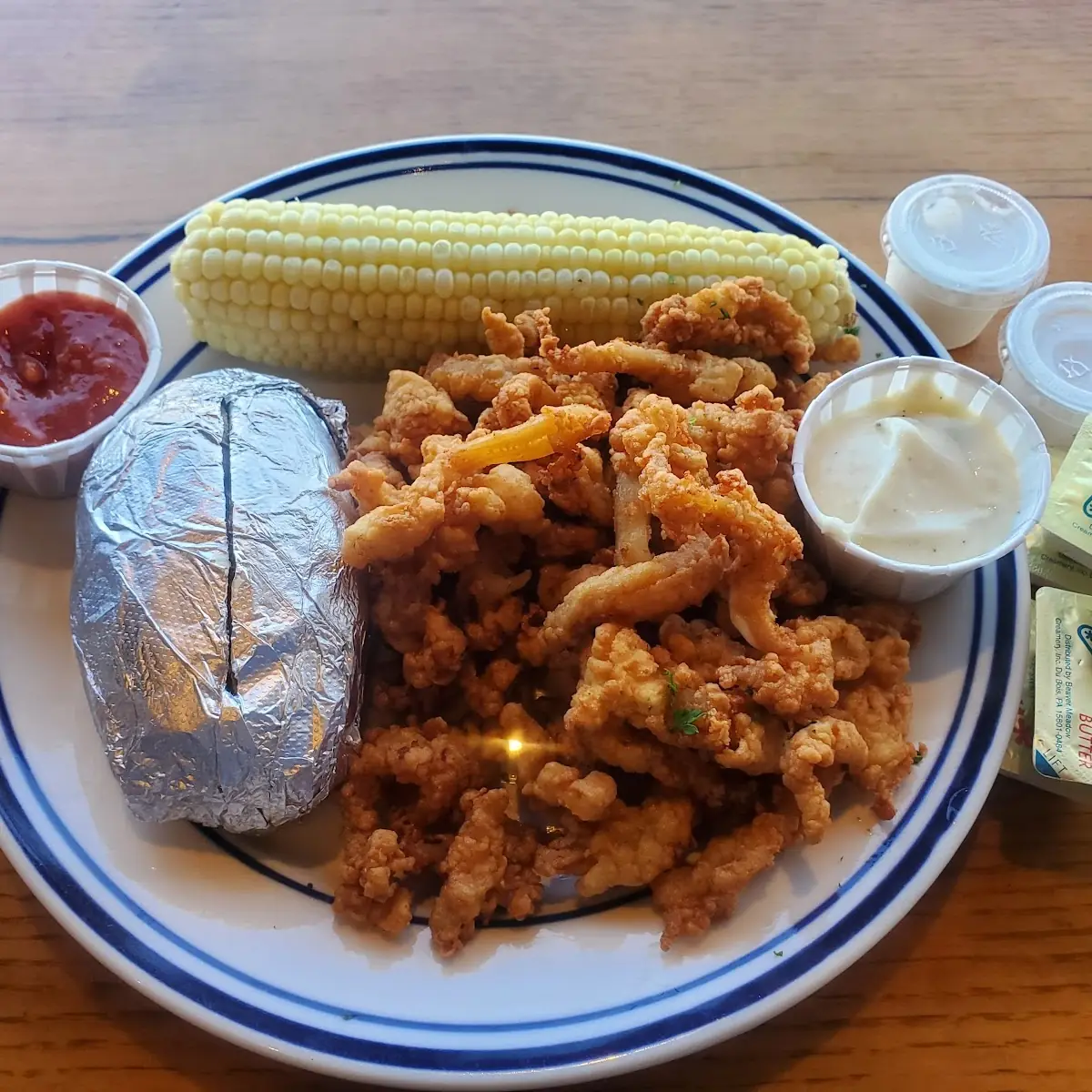 Clam Strips Baked Potato Corn
