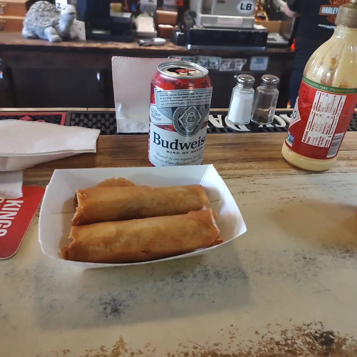 World Famous Egg Rolls and a Budweiser