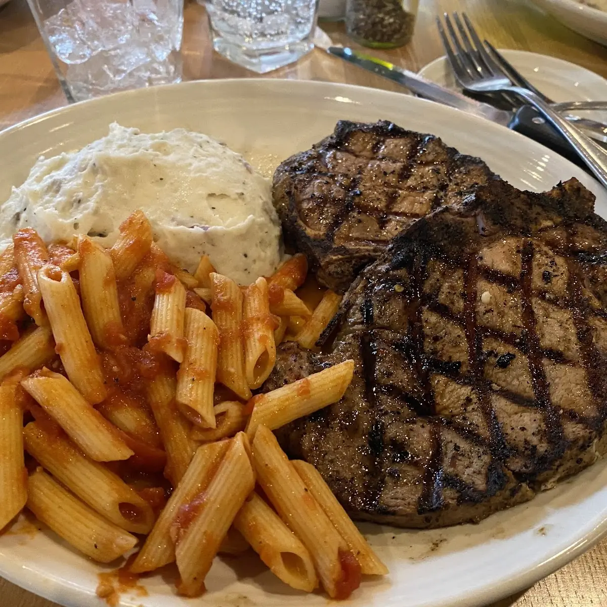 2 Chops Mashed Potatoes and Penne Pasta