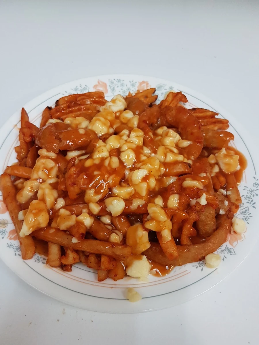 Poutine, Coq-o bec-lasalle