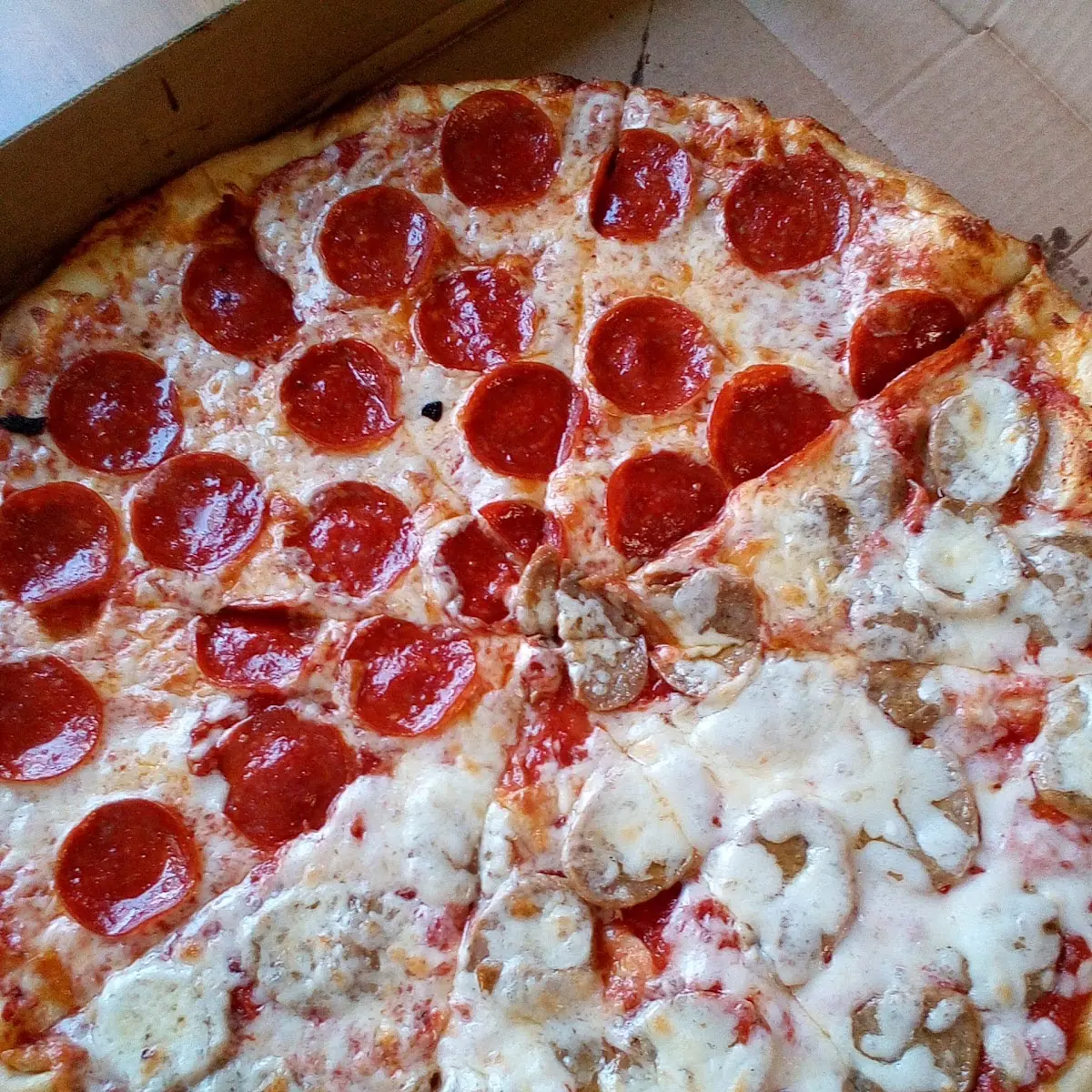 Half Pepperoni Half Sausage Pizza