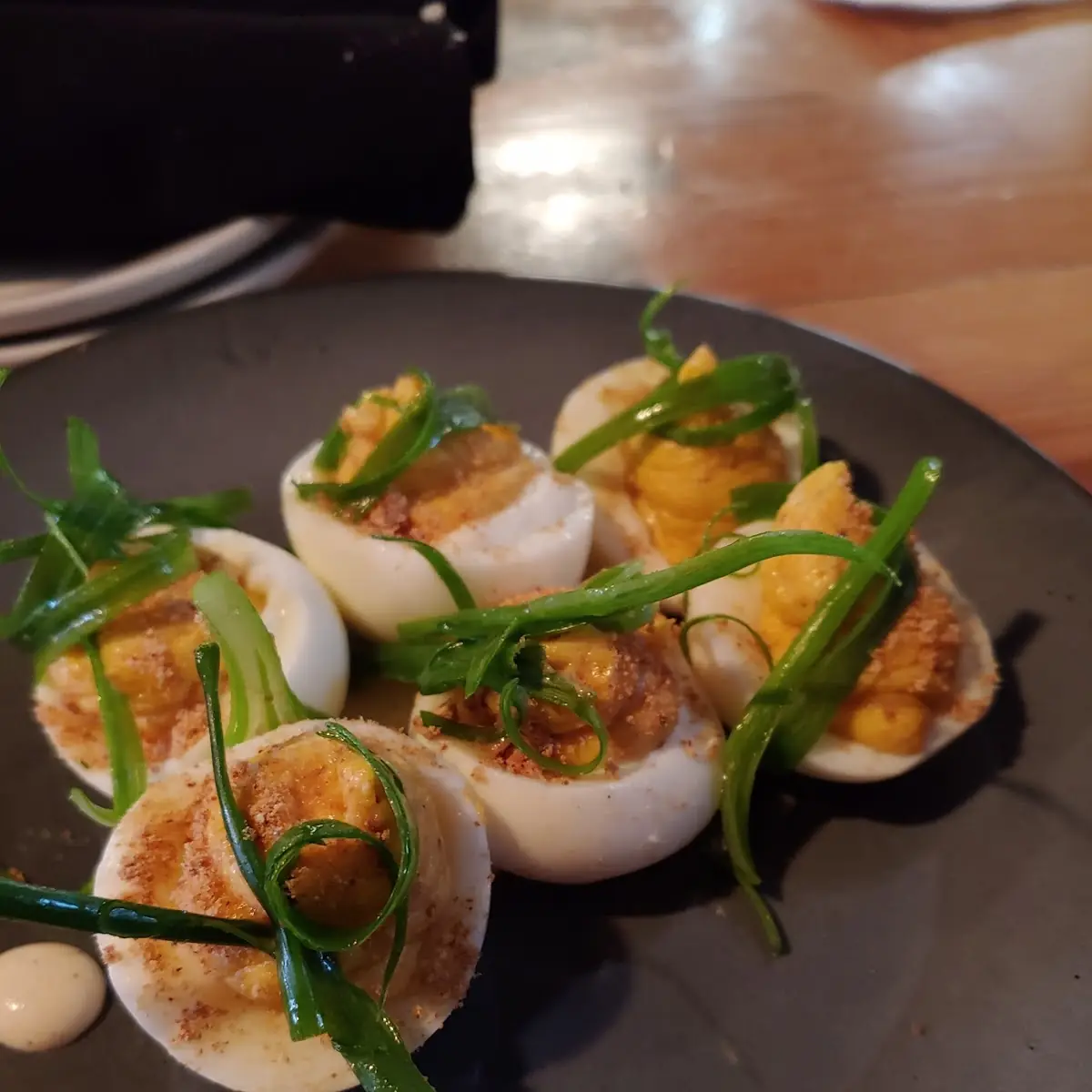 Barrel House Deviled Eggs with Crispy Chicken Skins Smoked Paprika Dill & Maple Sriracha D