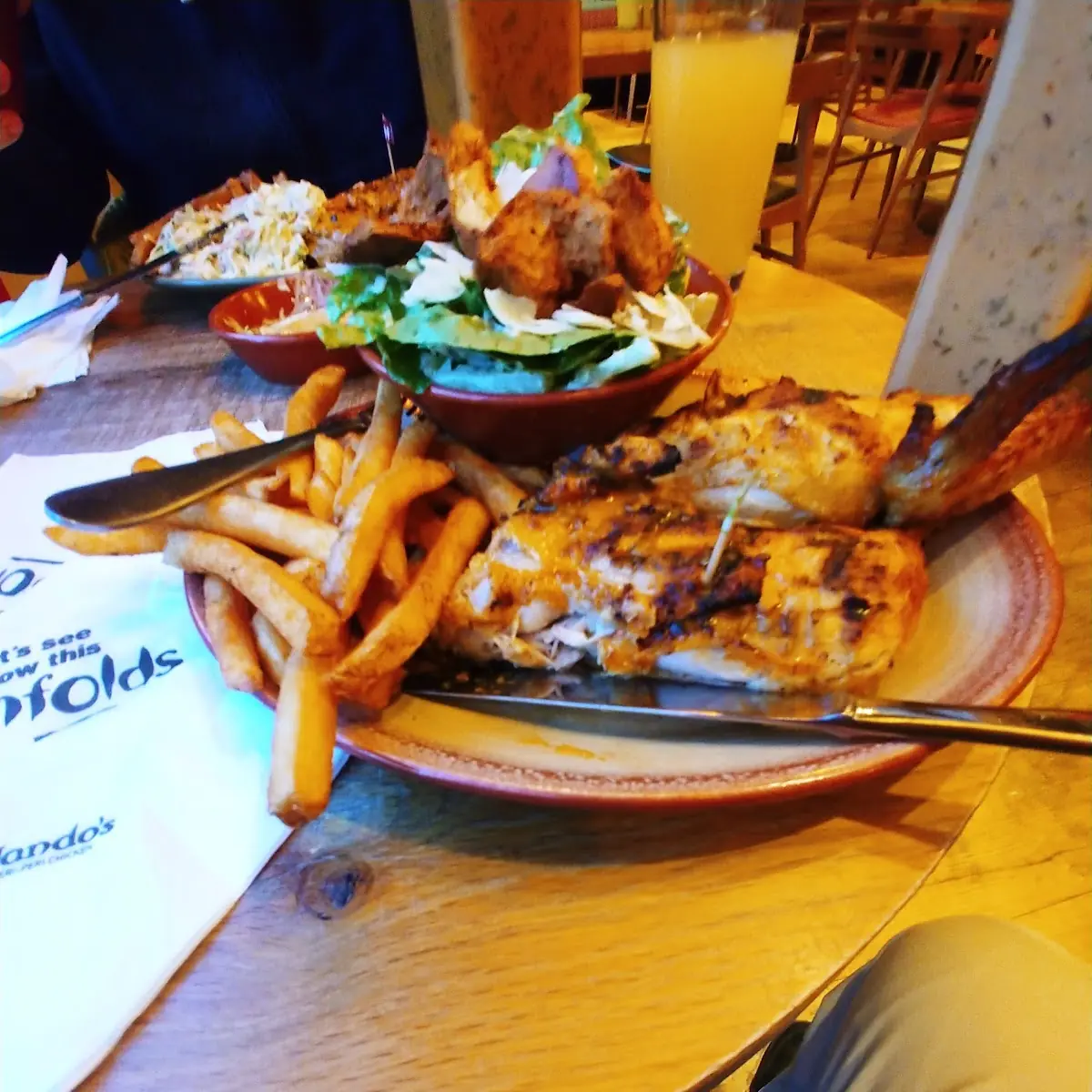 Half Chicken with Chips Fries and a Caesar Side Salad