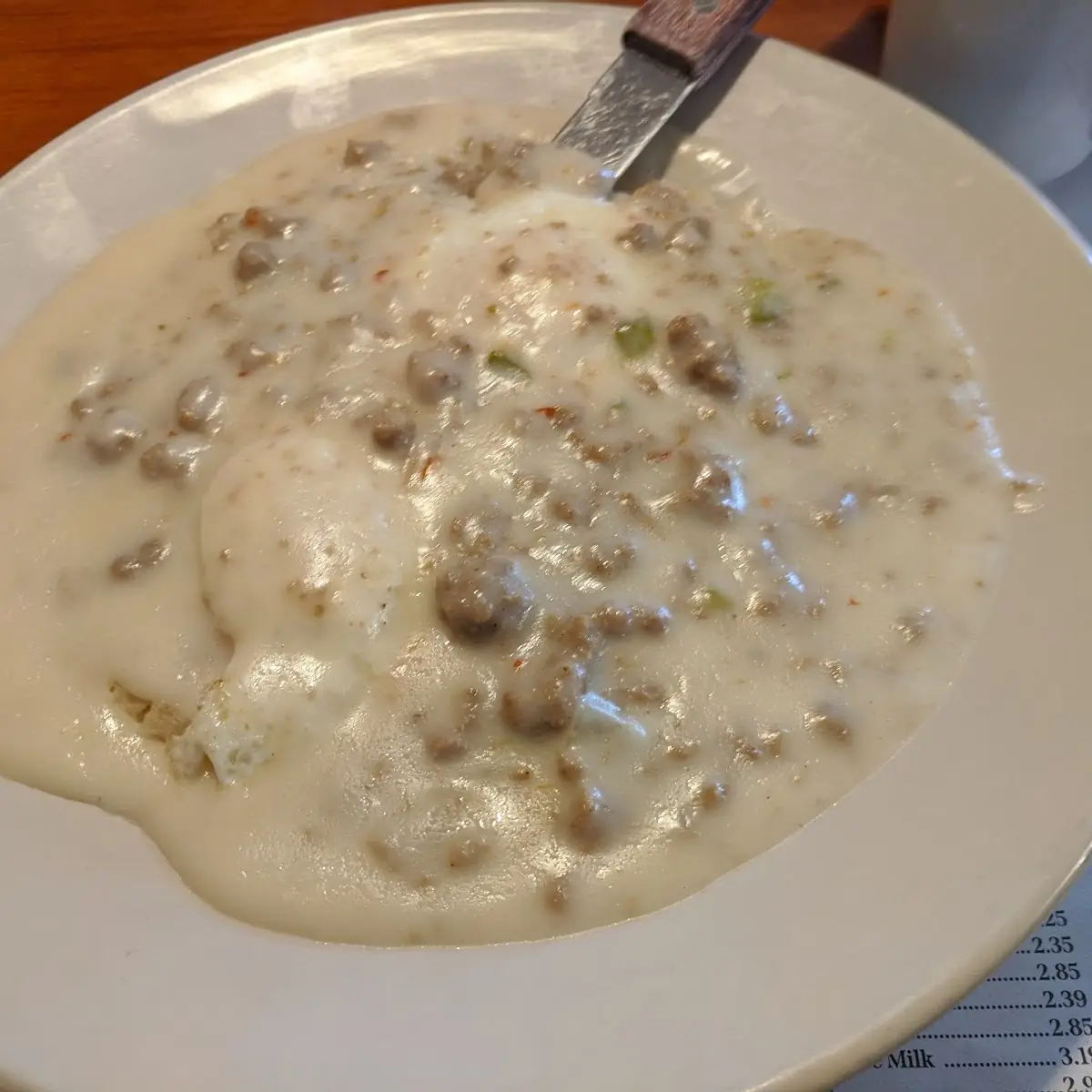 Sausage Gravy with Biscuits and Eggs over Light