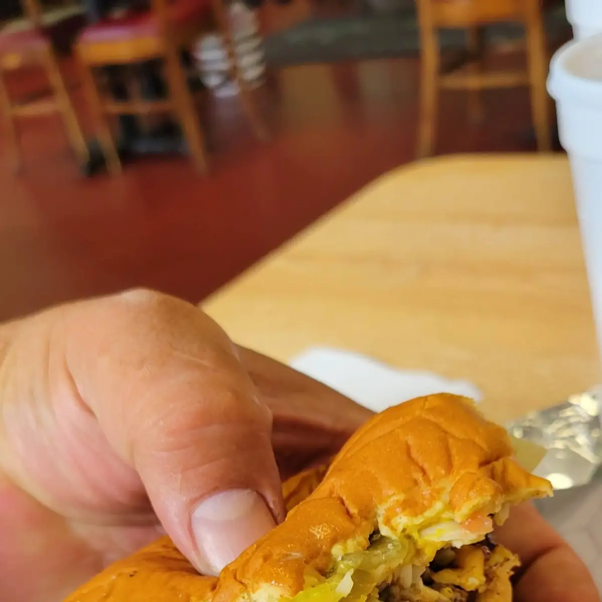 Double Cheese Burger That's Being Devoured Lol