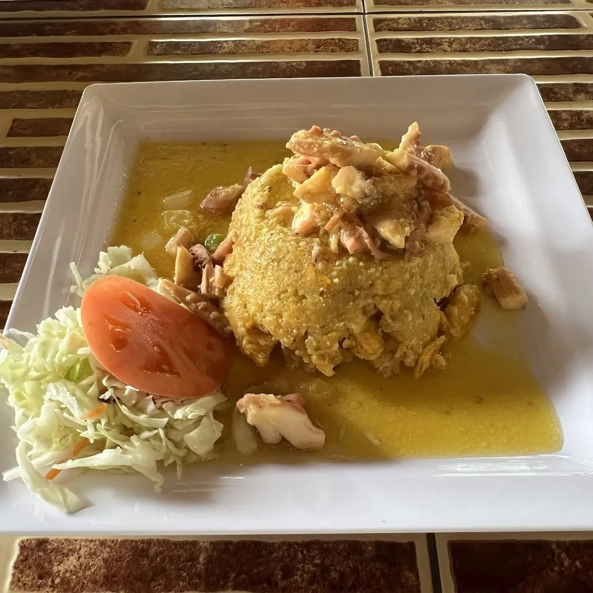 Mofongo Relleno de Pulpo Al Ajillo
